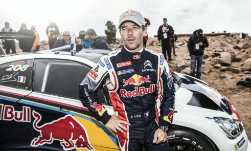 Sebastien Loeb Pikes Peak 2013 next to Peugeot 208 T16 Finish Line - carwitter