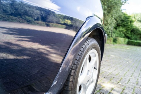 Mauritius Blue Peugeot 106 GTi - After Clean - Rear Arch - carwitter