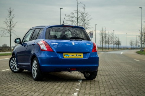 2015 Suzuki Swift DualJet - Rear Angle - carwitter