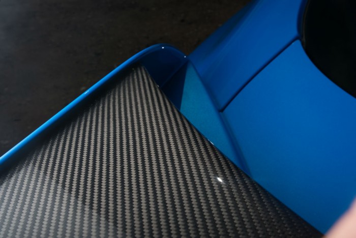 2014 Jaguar XFR-S Review - Rear Wing Carbon Detail - carwitter